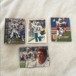 Lot of four Miami Dolphins Dan Marino trading cards